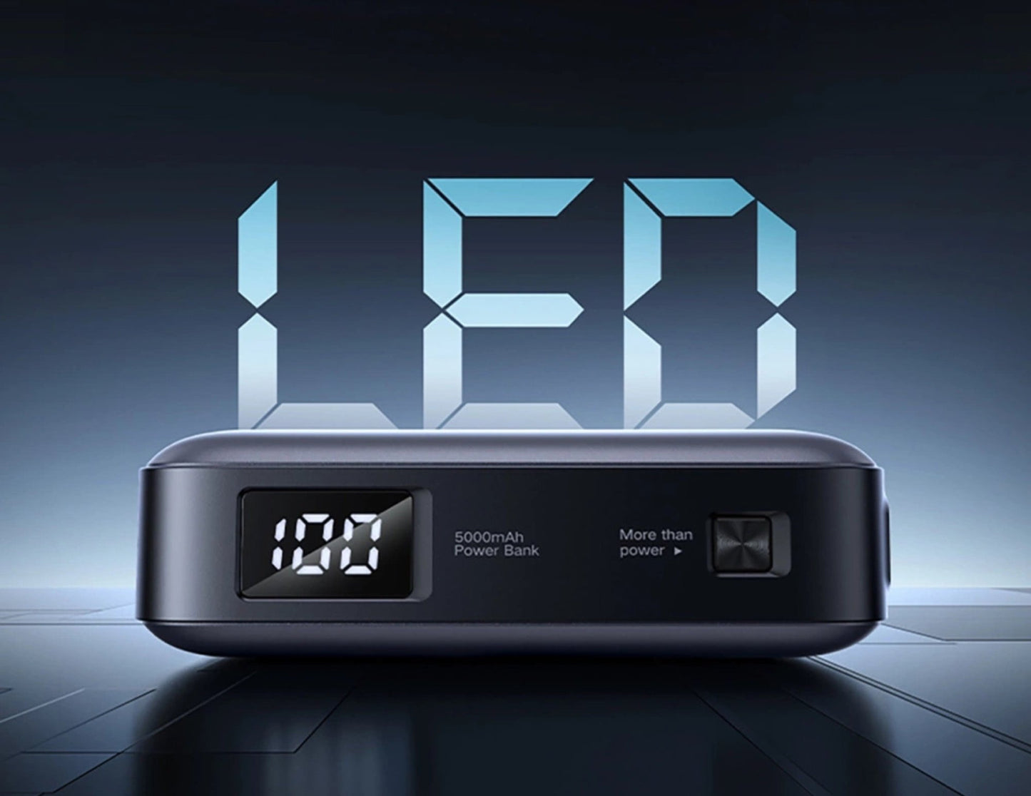 Black LED power bank with digital display on a dark background