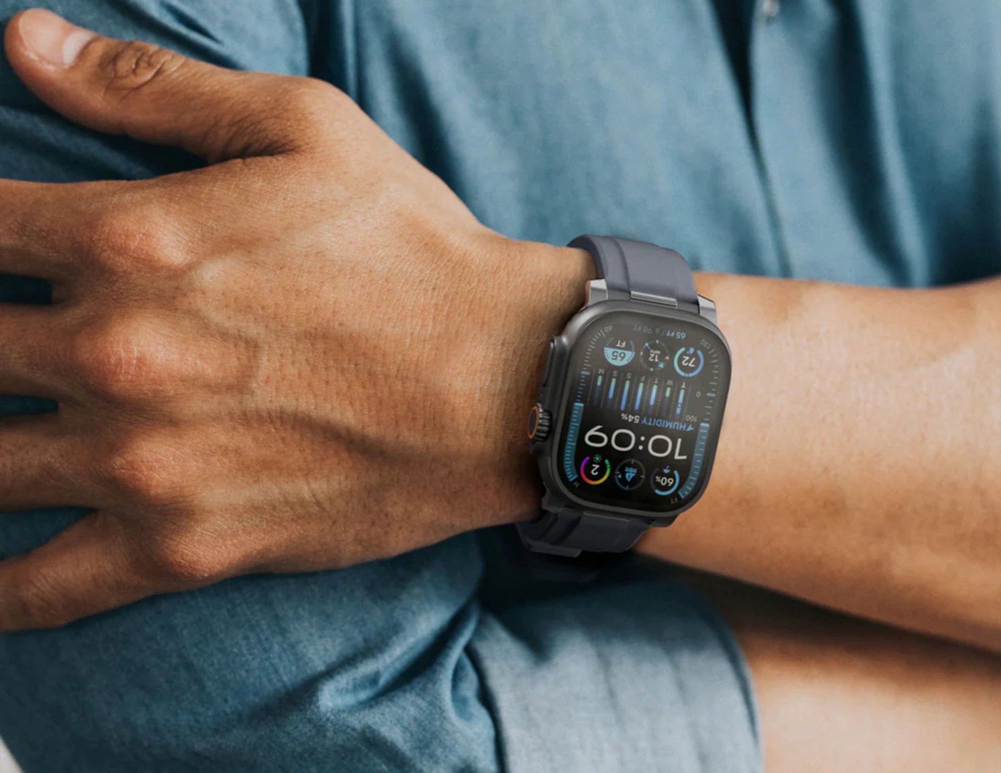 AmazingThing Titan Chrono Apple Watch Band for Apple Watch 49/46/45 – TRX46GB / TRX46SB on their wrist with a blue shirt