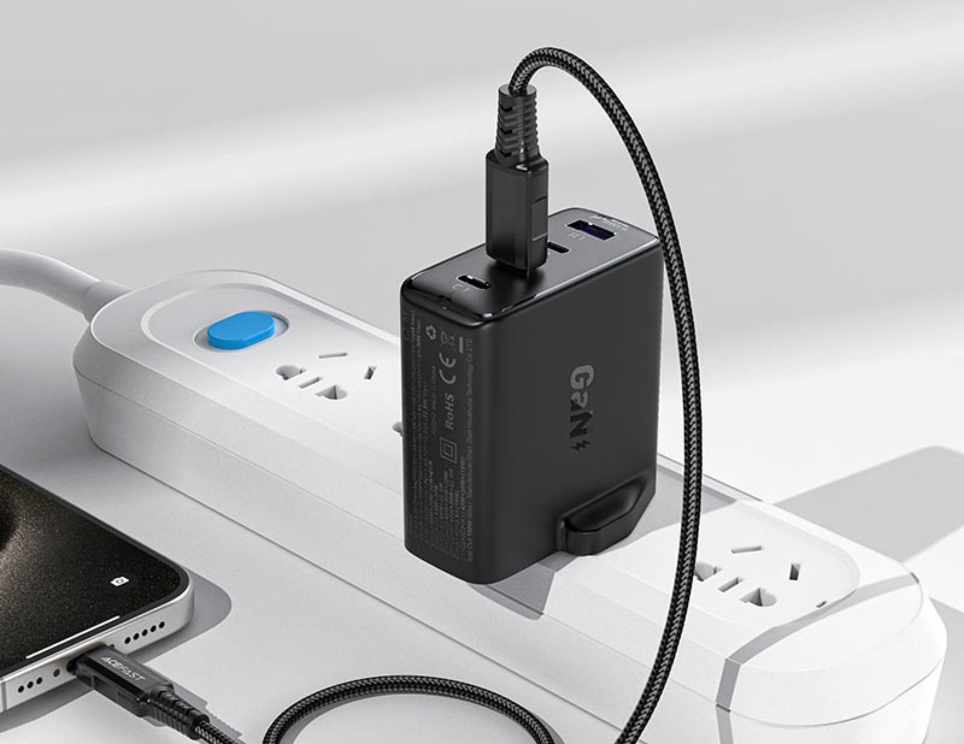 Acefast A97 100W GaN Wall Charger with multiple outlets and cables on a white background