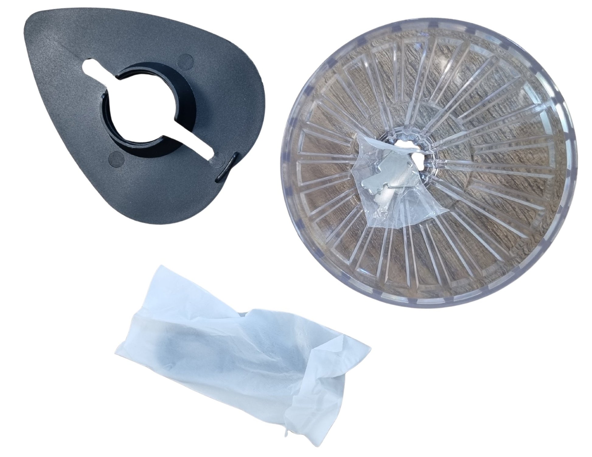 Set of dental impression trays and a plastic component on a white background