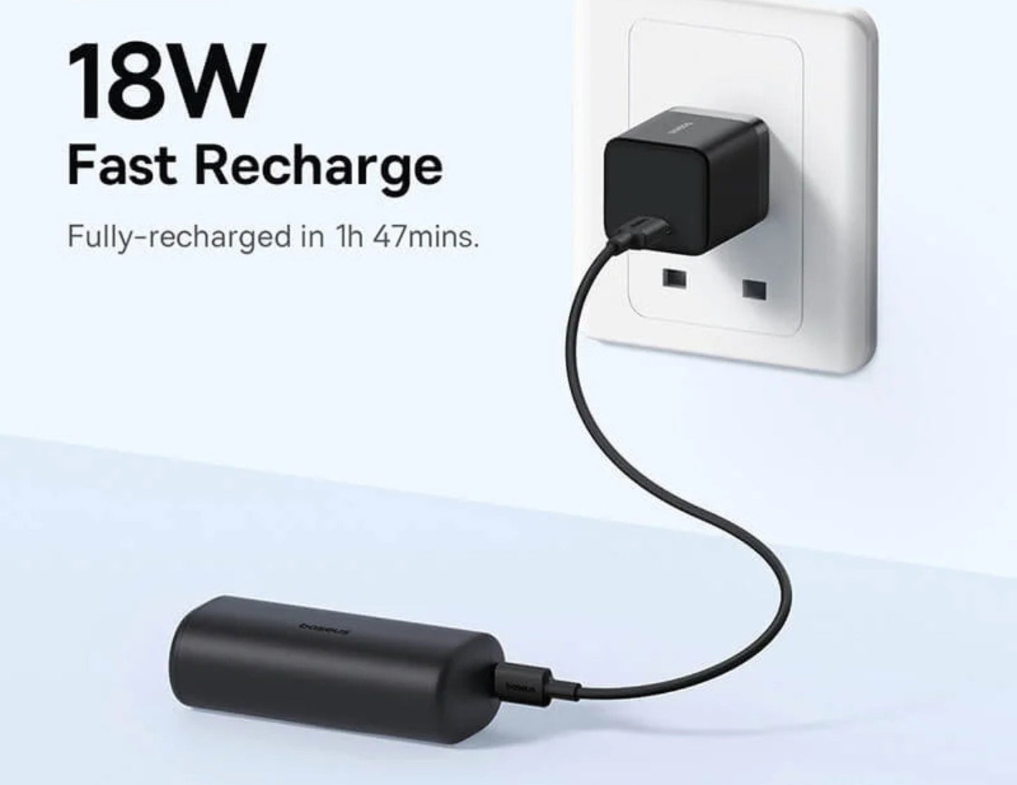 Black charging adapter connected to a wall socket with text indicating fast recharge capability.