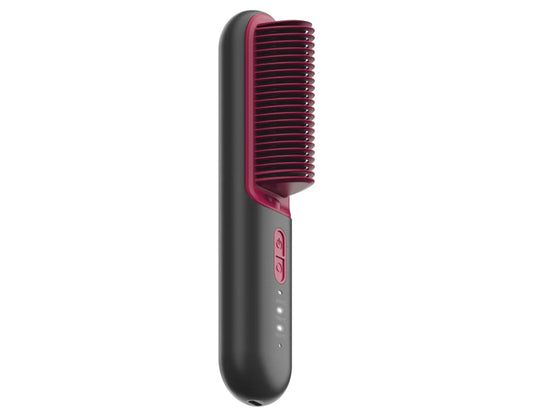Hair straightening brush with red bristle head and black handle on a white background