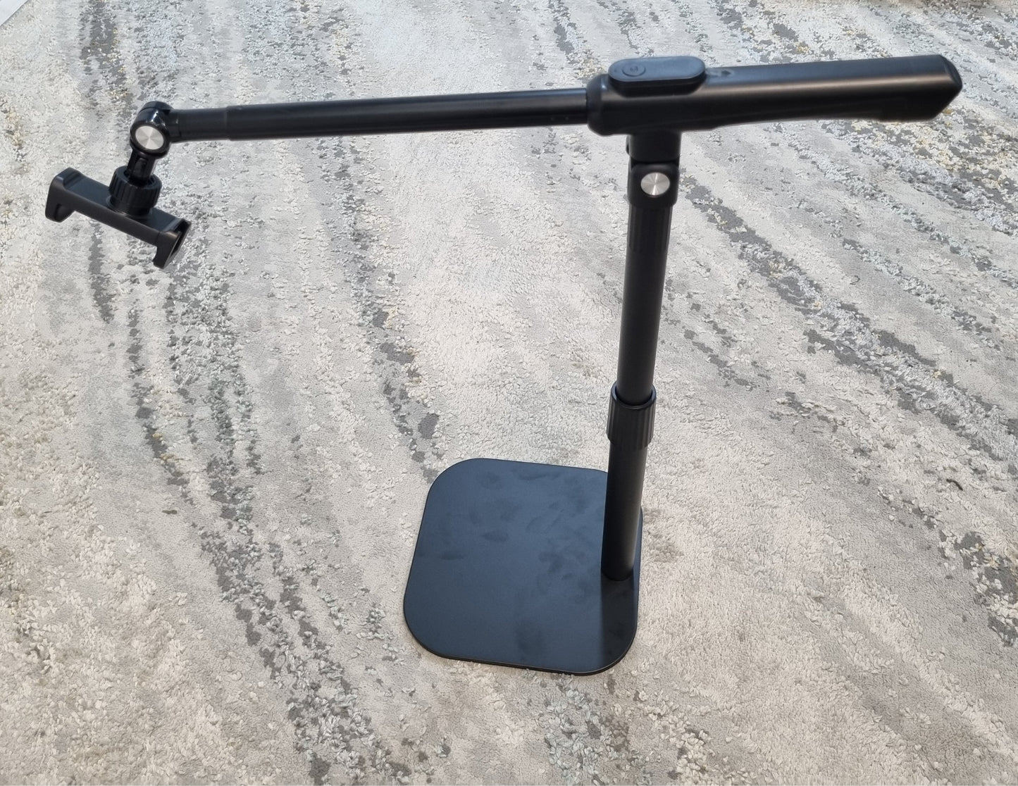 F7 Desktop Overhead Photography Stand with Multi-Axis Adjustment A-F7-ZMSJH – Black on a concrete surface