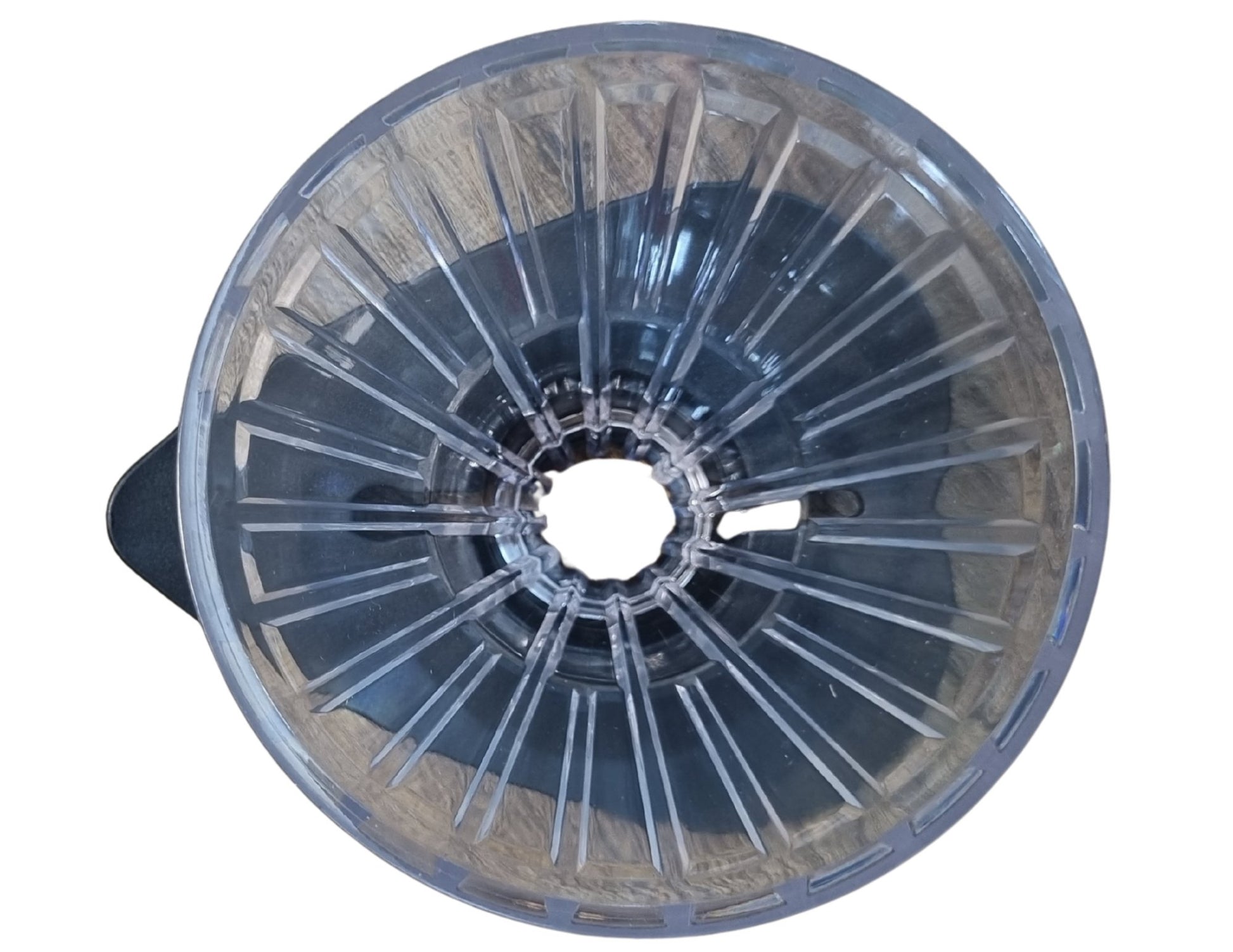 Clear plastic wheel with a black rim on a white background