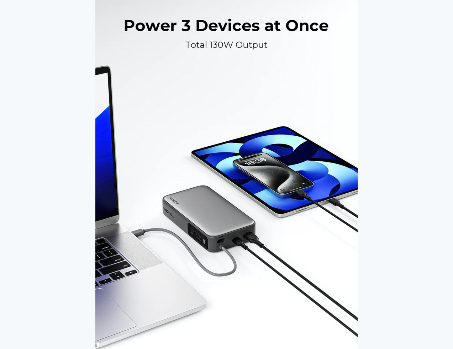 Portable Aukey PB-Y43P Sprint X 130W PD 20000mAh Power Bank – Gray charging a laptop and smartphone with text 'Power 3 Devices at Once' and 'Total 130W Output'.