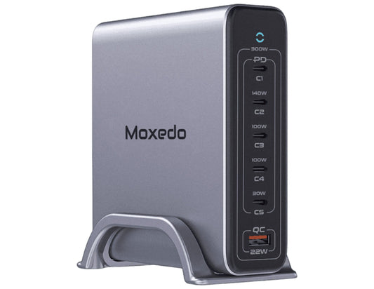 A black Moxedo Volton II PD GaN 300W Desktop Charger with multiple ports and a detachable metal base.