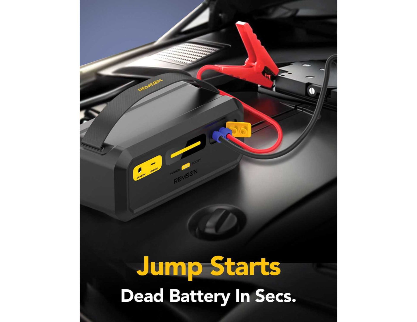 Remson Re‑Boost Mate Built‑in Super Capacitor Emergency Jump Starter – JS009 on a car battery with text 'Jump Starts Dead Battery In Secs.'