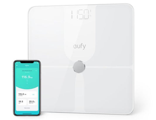 Eufy smart scale with smartphone displaying app on a white background
