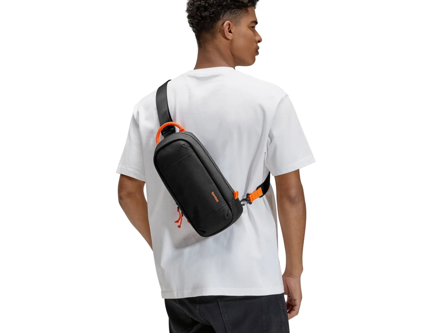 Person wearing a Tomtoc GameOn-G49 Nintendo Switch 2 Sling Bag – Black (G49S1D1) on a white background