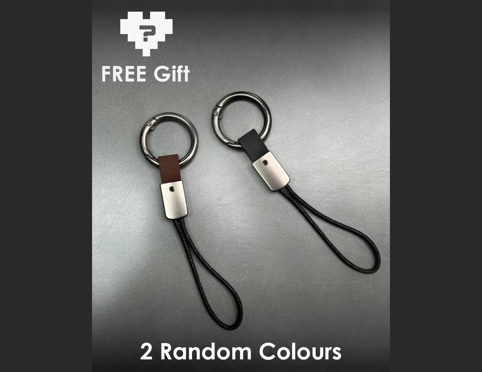 Two keychains with leather loops on a gray background, featuring a free gift offer.
