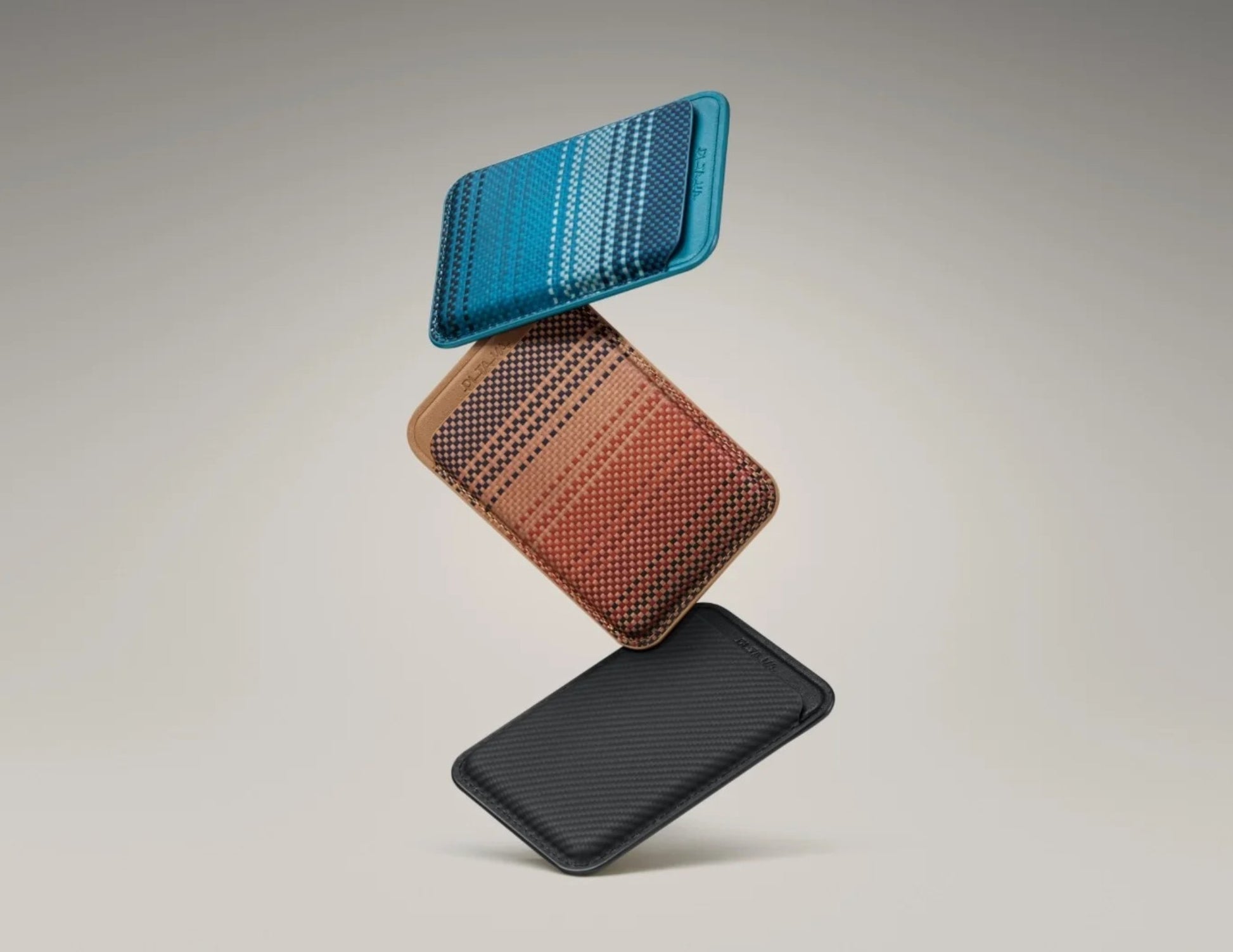 Three Pitaka MagSafe Woven Wallet – Magsafe Compatible MWW240 in blue, brown, and black on a light gray background