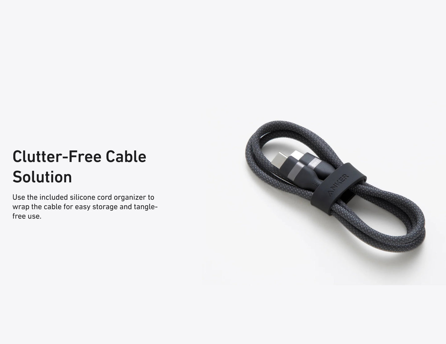 Black cable with a silicone cord organizer on a white background