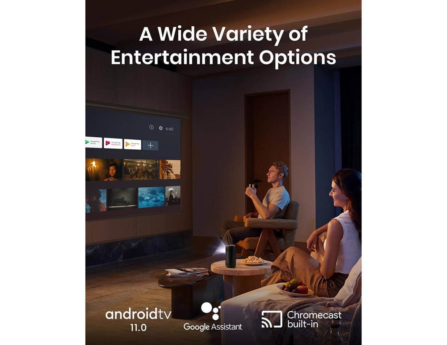 Two people sitting in a dimly lit room watching a screen displaying entertainment options with Anker Nebula Capsule 3 Laser (D2426212) - 1080p HD Portable Projector