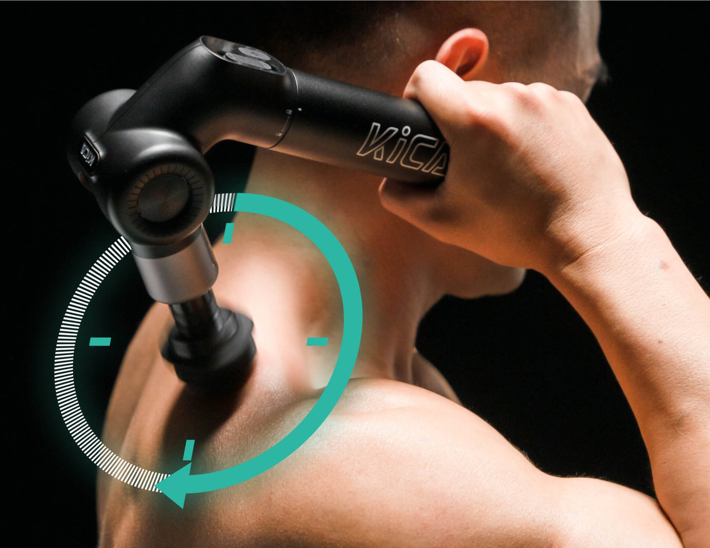 Person using a Kica Evo Fascia Massage Gun on their shoulder with a black background