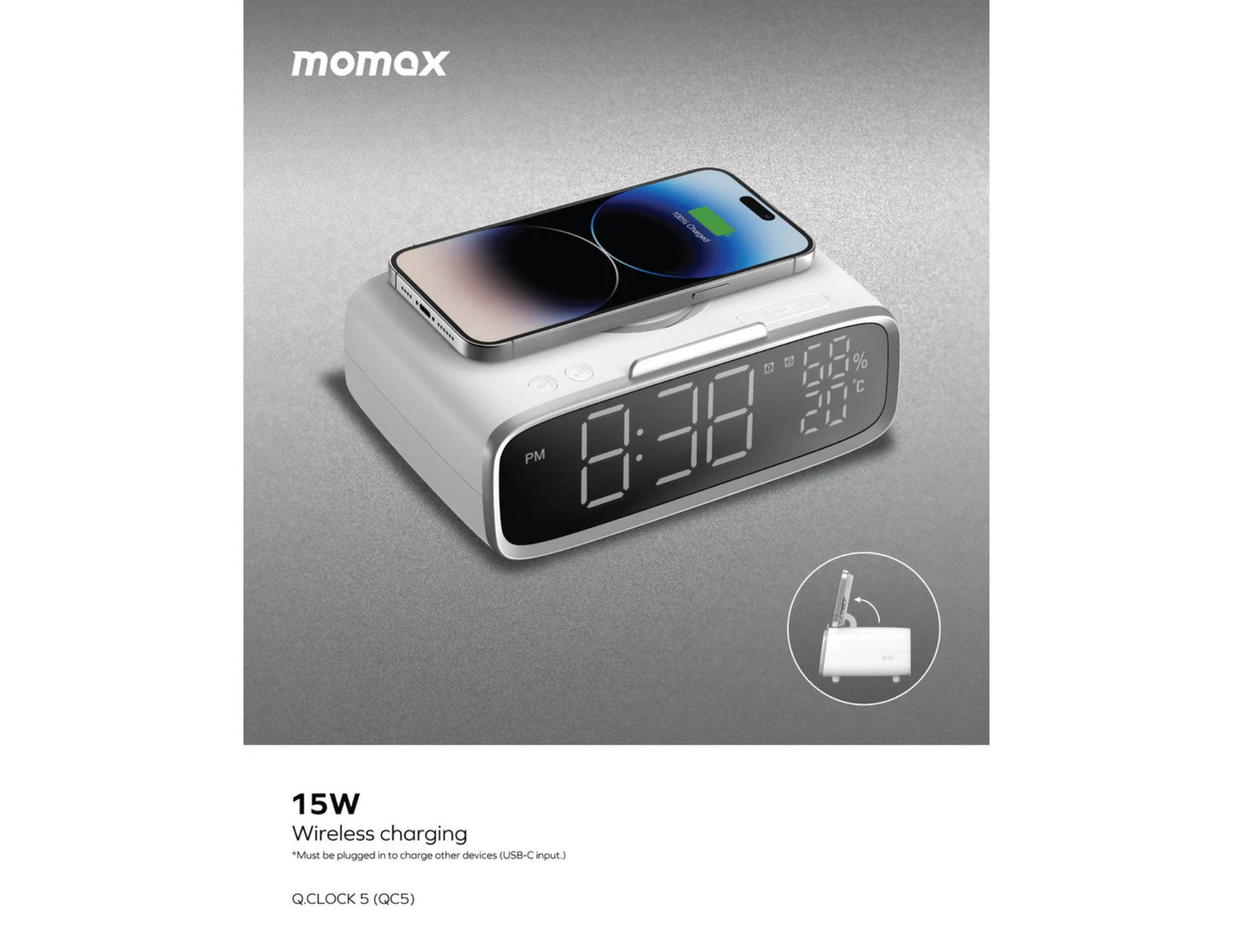 Wireless charging clock with smartphone on a gray background, featuring the momax brand.