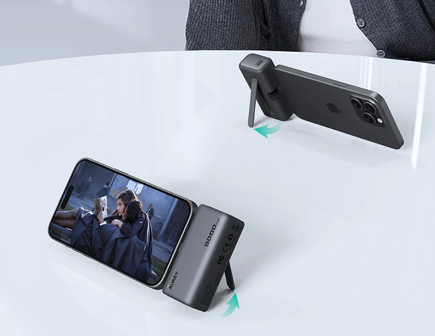 Aukey Spark Mini power bank with built-in kickstand for hands-free phone support.