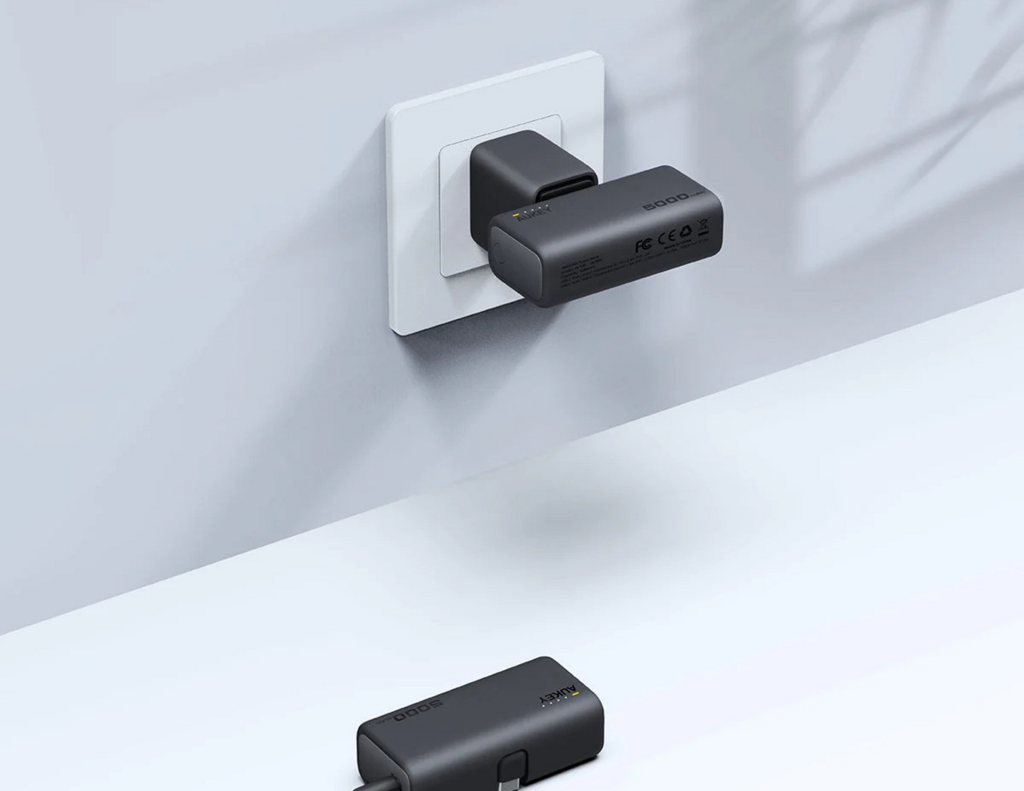 Side view of Aukey Spark Mini PB-Y59-GY highlighting its sleek and portable build.