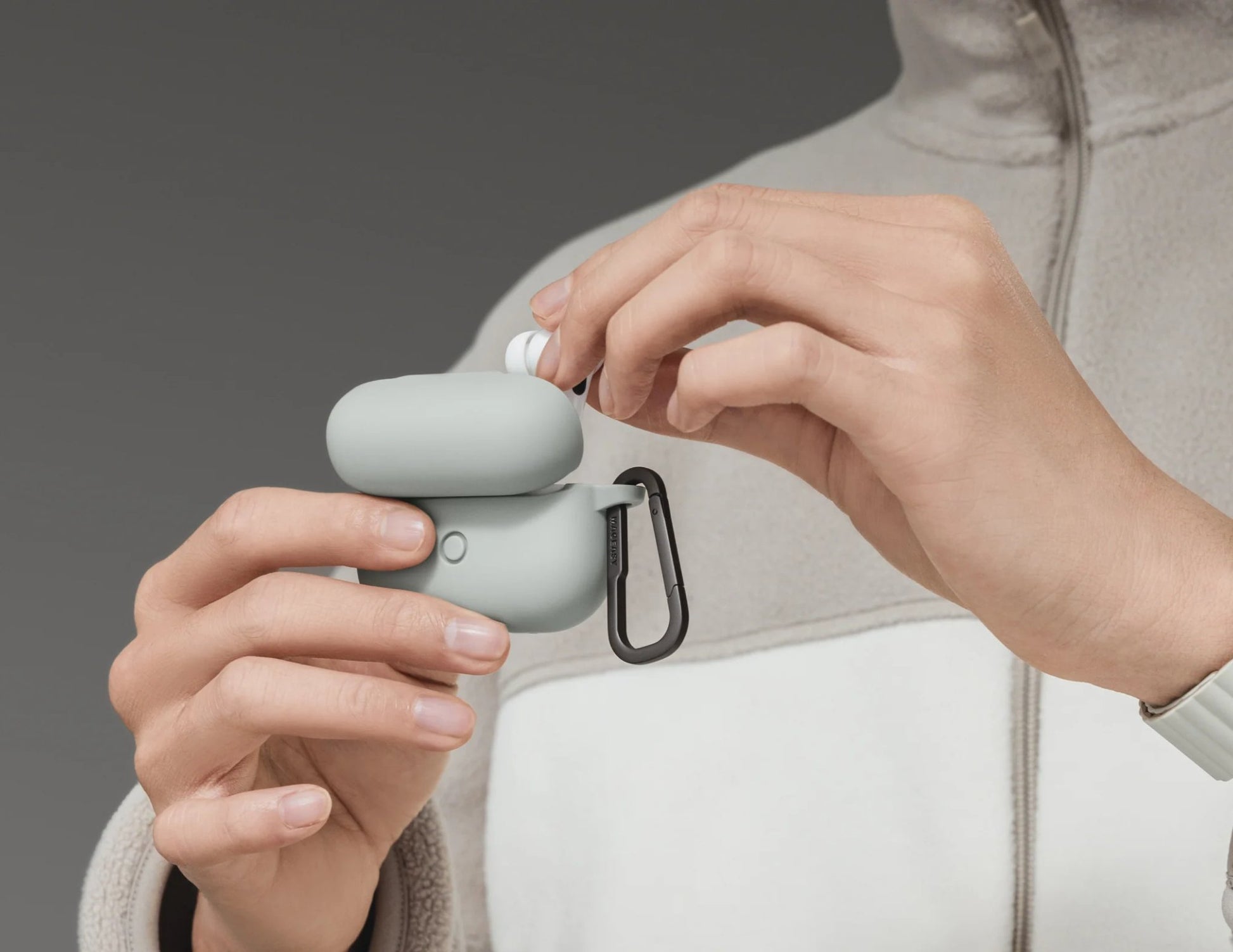 Detachable carabiner attached to the MagEasy Skin AirPods Case.