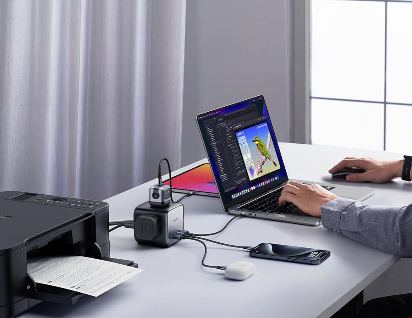 Ugreen Diginest Cube Power Strip CD268 charging multiple devices simultaneously.
