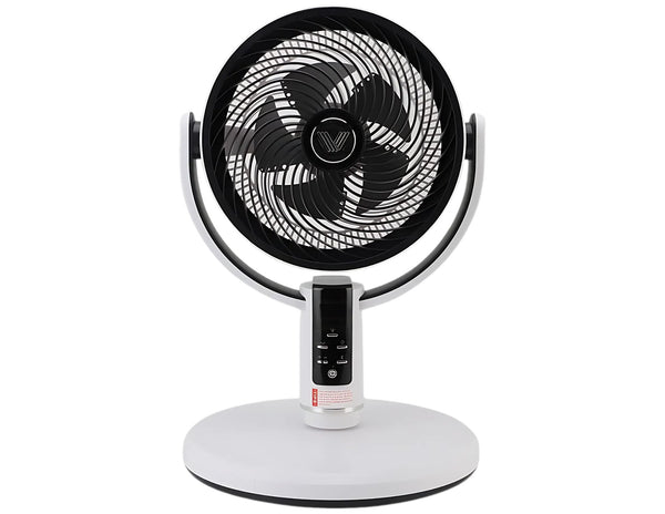 Tabletop fan with black blades and white base on a white background