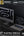 Laptop and monitor with 8K display and fast charging features on a dark background