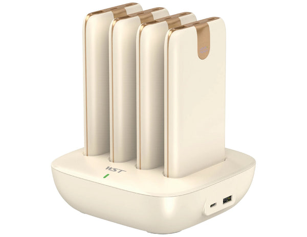 A WST gold 4-in-1 power bank docking station with four detachable power banks and built-in charging cables.