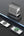Wireless charging station with devices on a dark surface