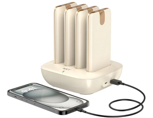 wst Charging station with four slots and a smartphone being charged.