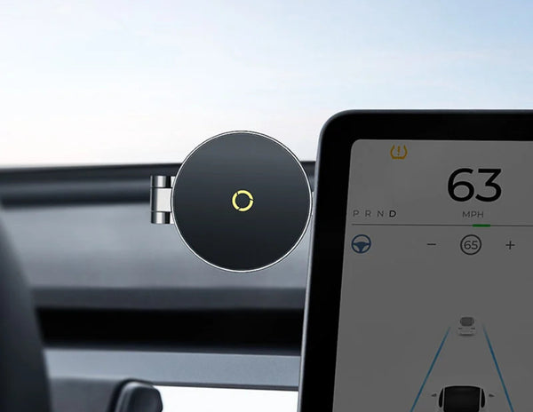 Car dashboard with a navigation device displaying speed and other information.