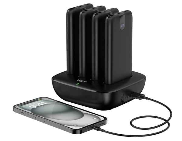 wst Black multi-device charging station with a smartphone being charged.