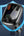 Car charger with Bluetooth receiver on a blue shield background