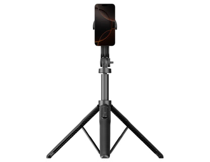 Black Momax 1-Snap Pole Magnetic Tripod Selfie Stick with Wireless Remote – KM17D with a phone on a white background