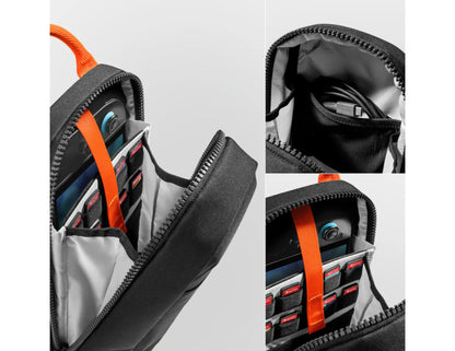 Tomtoc GameOn-G49 Nintendo Switch 2 Sling Bag – Black (G49S1D1) showing compartments and items inside on a light gray background