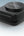 Black electronic device with 'Moxedo' branding on a light gray background