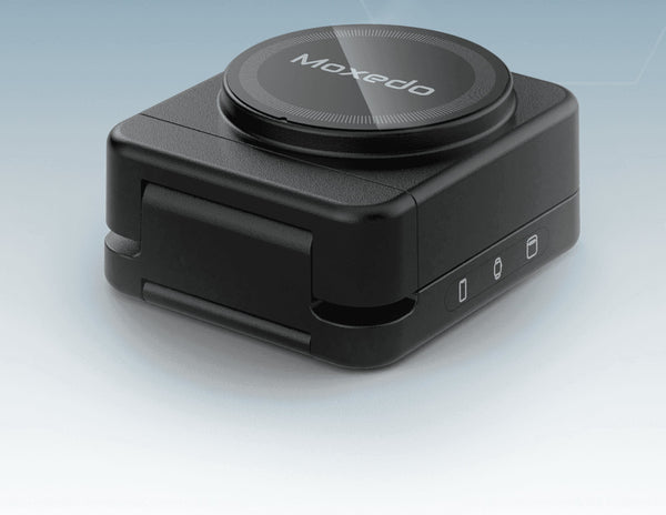 Black electronic device with 'Moxedo' branding on a light gray background