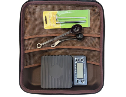 Brown mesh pouch with tools and digital scale on a white background
