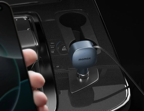 Momax 1-Move⁺ 2-Port Car Charger With Built-In Retractable Cable 60W (UC19E) being installed into a car's cup holder.