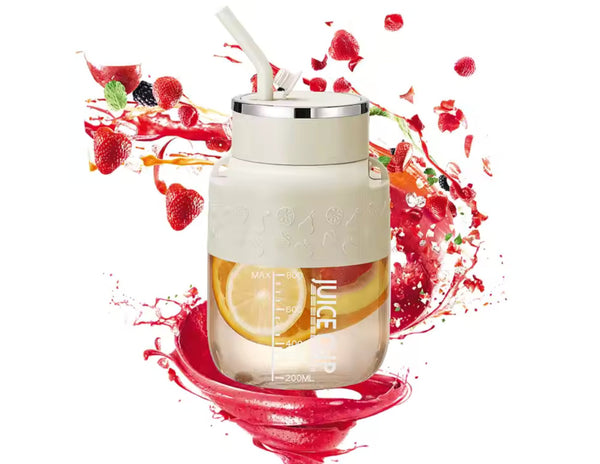 Juice container with lemon design and red berries on a white background