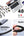 Laptop and smartphone connected to UGREEN USB-C to USB-C PD Fast Charging Cable 60W 1M Braided Nylon – US261 with technical specifications on a white background