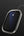 Smartphone with a 9M synthetic sapphire screen protector on a black background