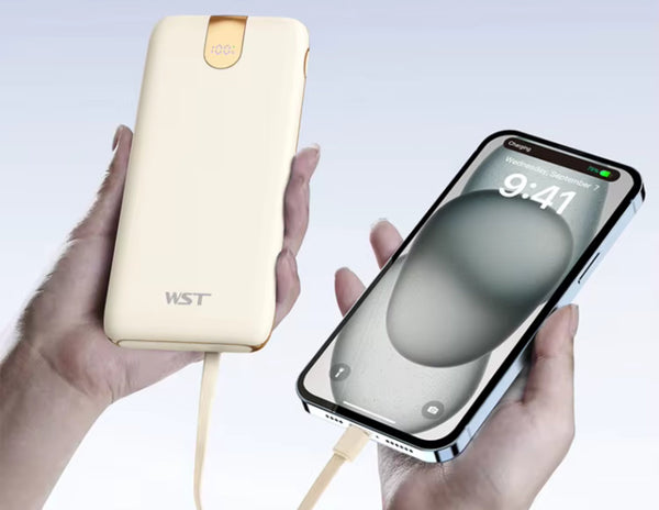 Beige wst power bank connected to a smartphone.