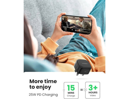 Person holding a smartphone with UGREEN 25W Type-C PD UK Fast Charger + 2m Cable – CD250 on a white background