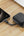 Acefast M15 10000mAh Power Bank connected to a smartphone on a wooden surface