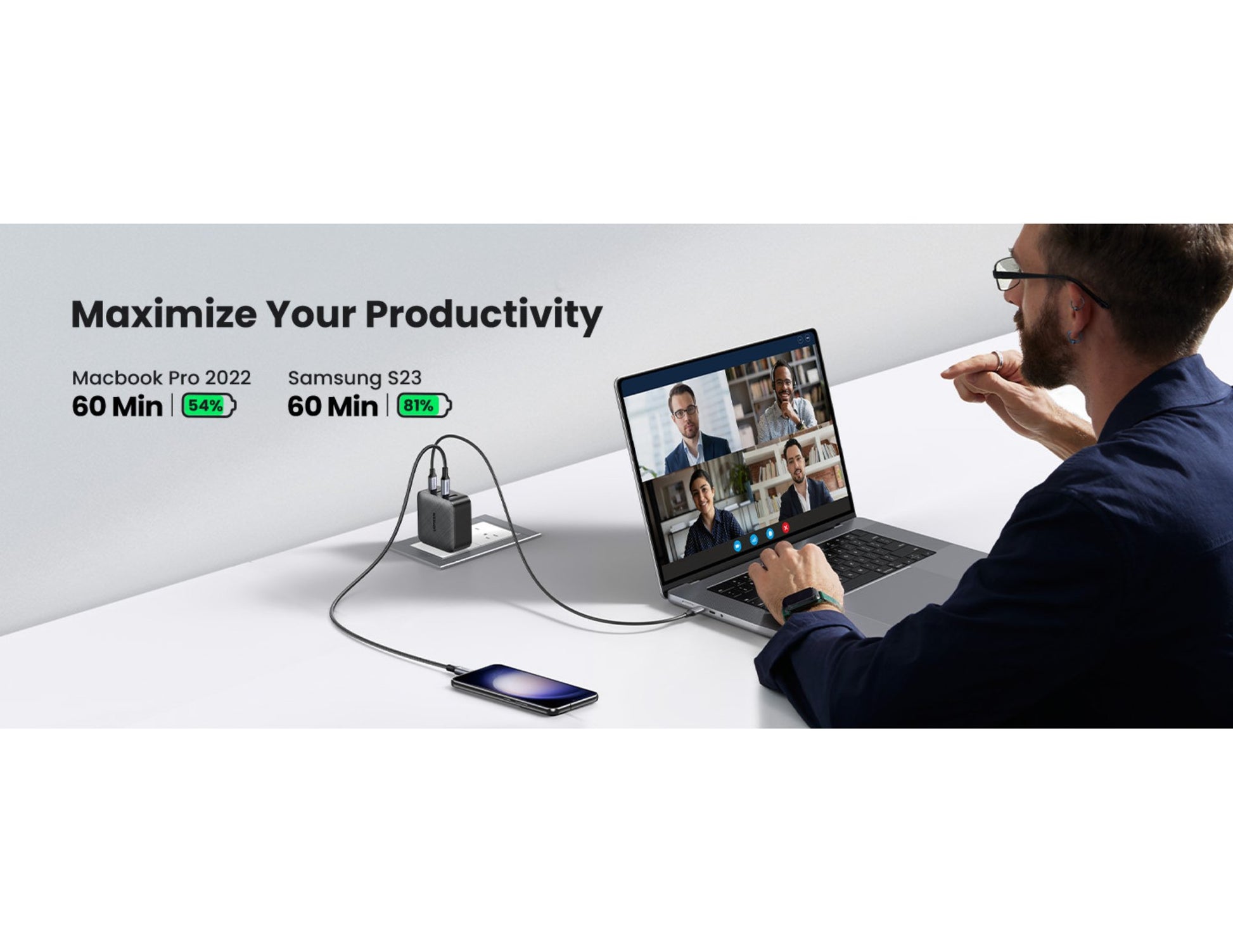 Person using a laptop with a video call on a white desk, with text about productivity and device specifications.
