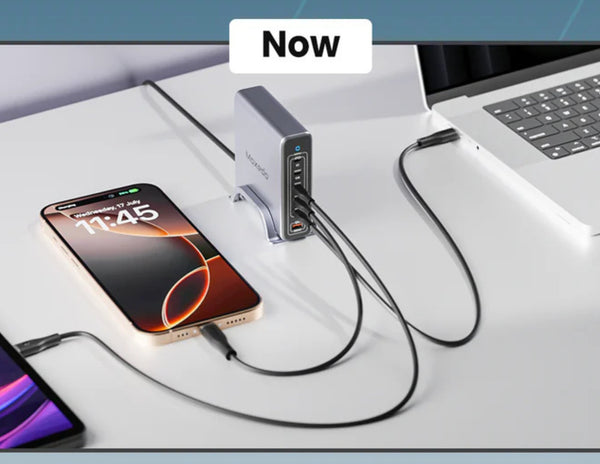 USB hub connected to a smartphone and laptop on a white surface with 'Now' text above.