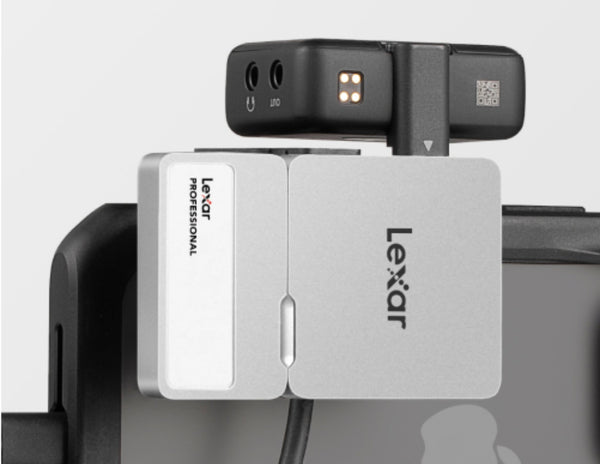 Lexar camera module with attached card reader on a gray background