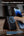 ESR HaloLock Power Bank Wallet 5000mAh with Stand – Black with magnetic attachment feature being demonstrated