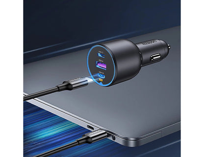 Car charger with multiple USB ports connected to a laptop on a dark background