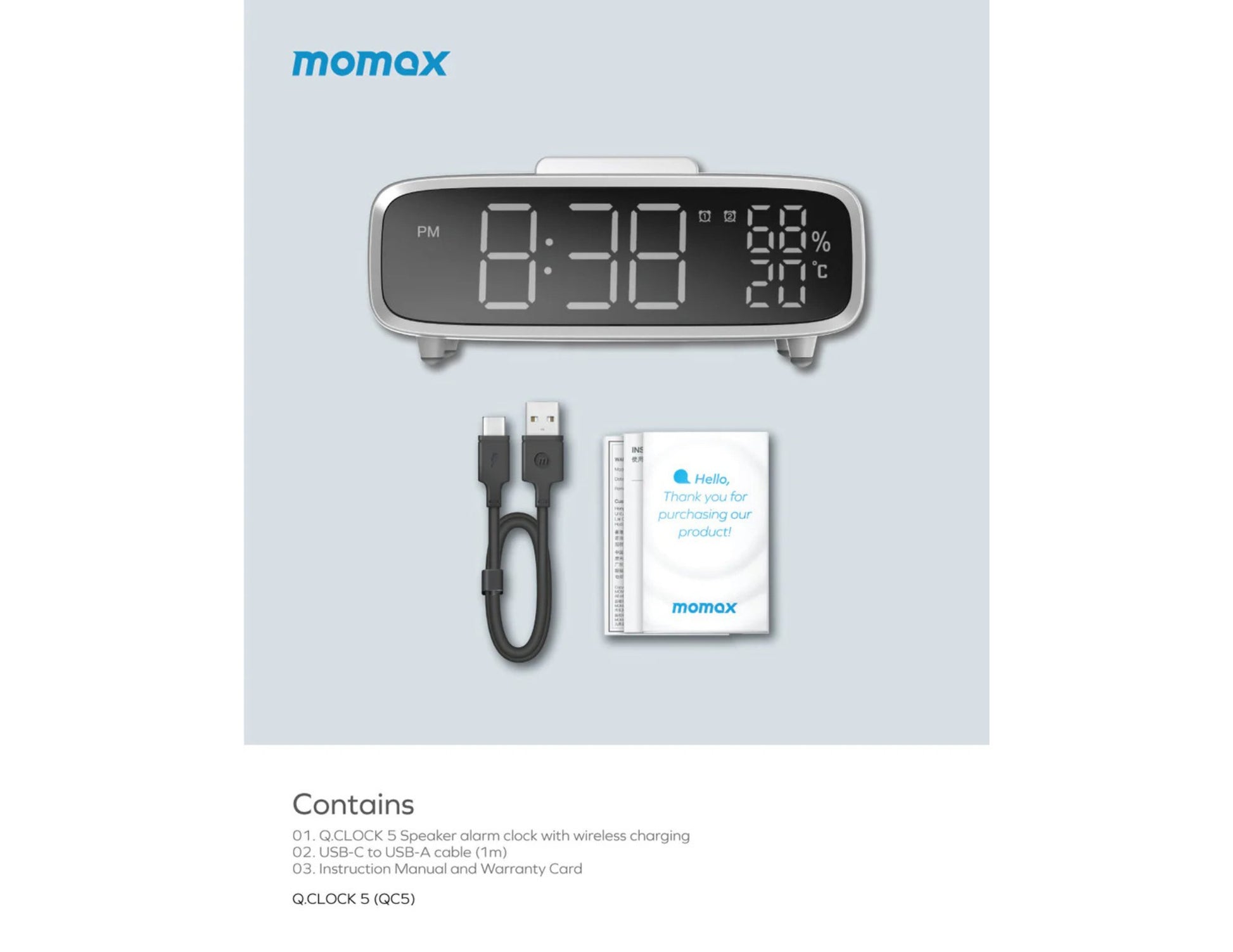 momax digital clock with wireless charging pad, USB cable, and instruction manual on a light gray background