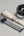 Three Apple Watch bands in different styles on a gray surface.